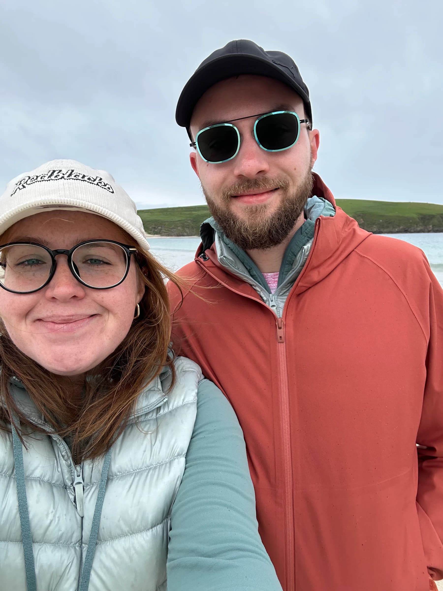 Rachel and Reid on a windswept Shetland beach